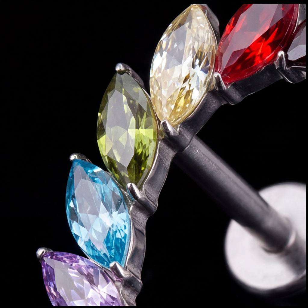 Aurora — Six marquise stones in a rainbow arc