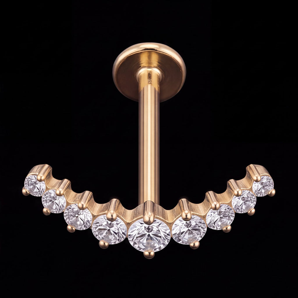 Celeste — A crescent of nine graduated stones