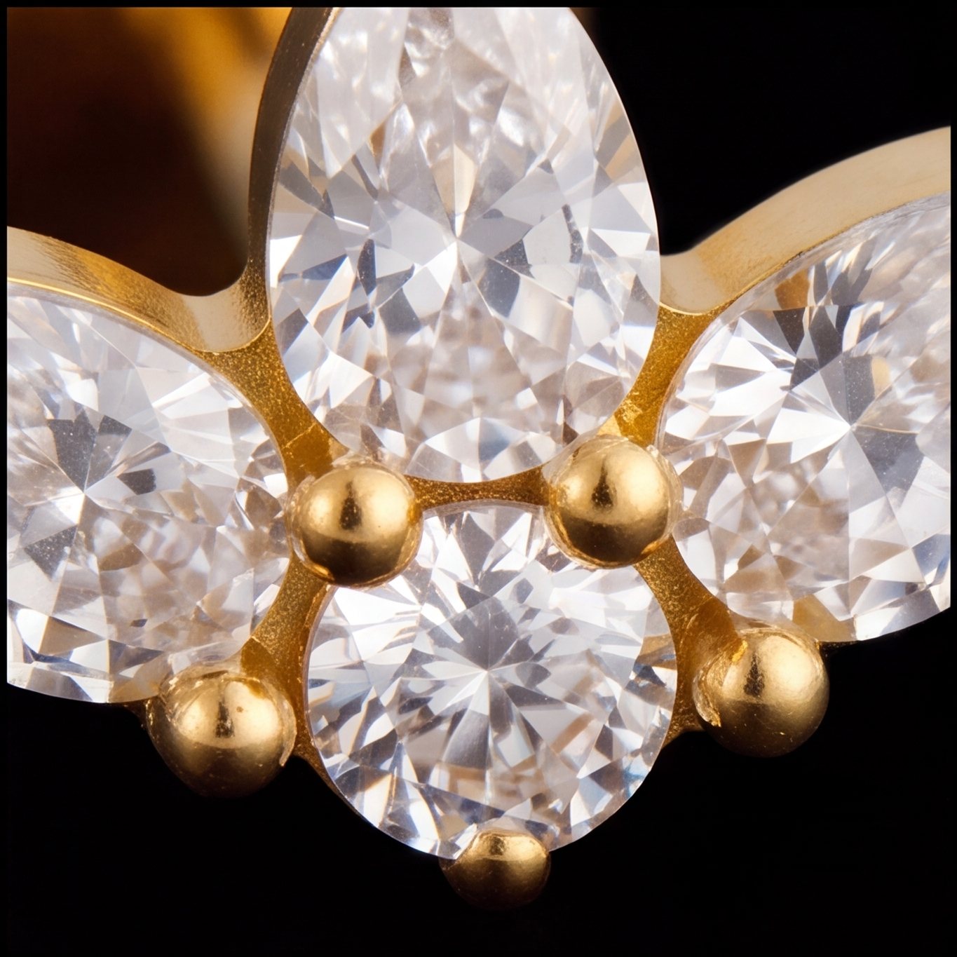 Fleur — Three golden dewdrops in bloom
