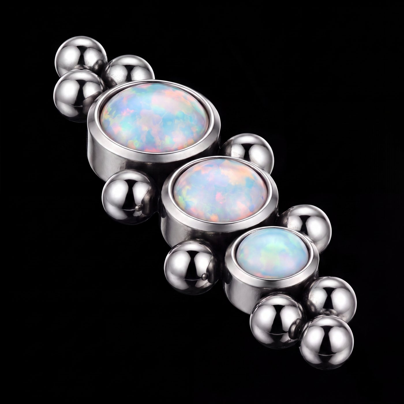 Iris — Three opals descending in titanium