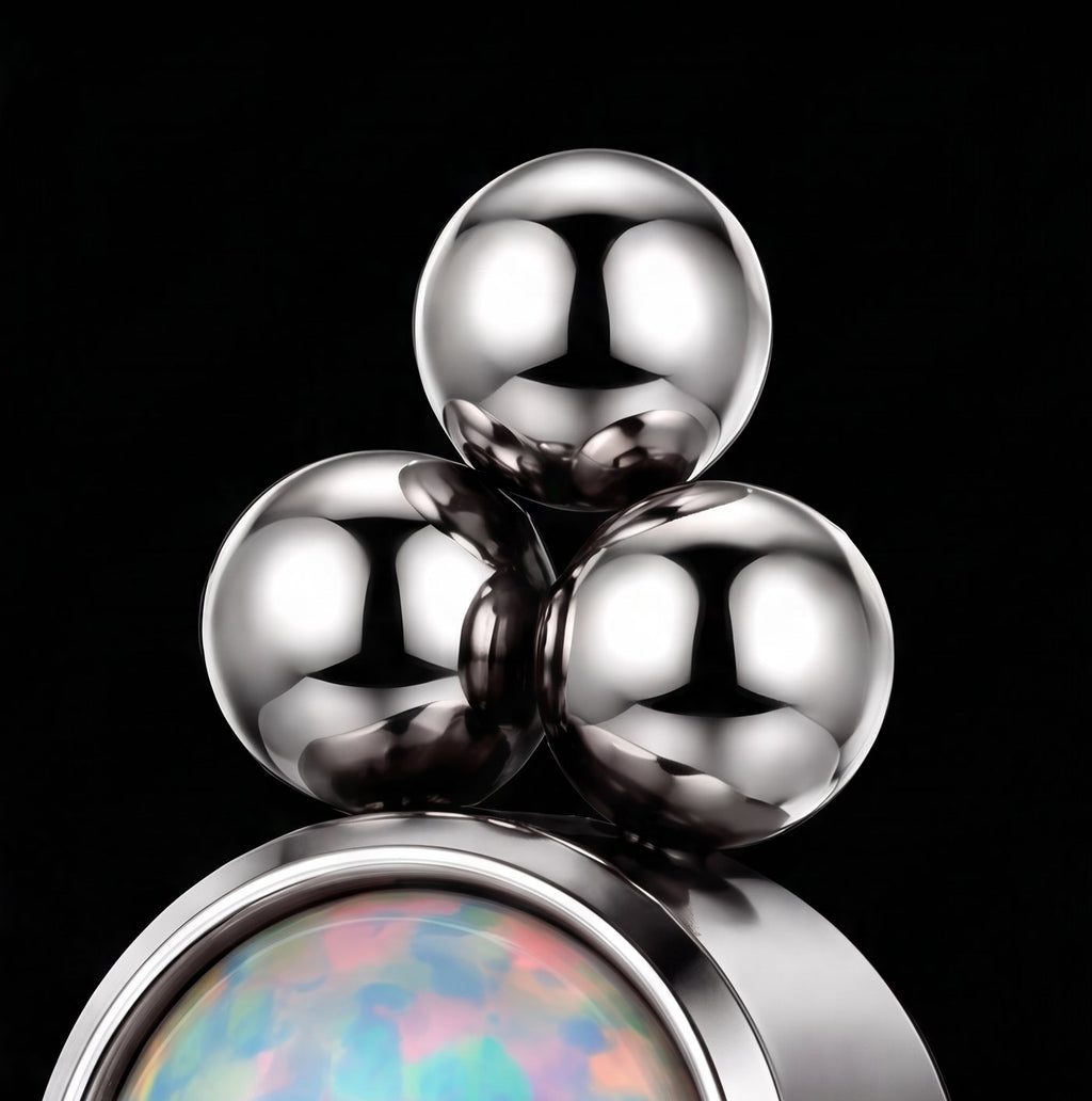 Iris — Three opals descending in titanium