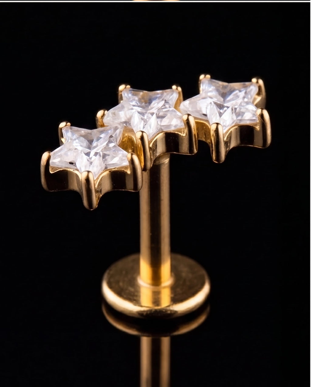 Stella — Three star-cut crystals ascending