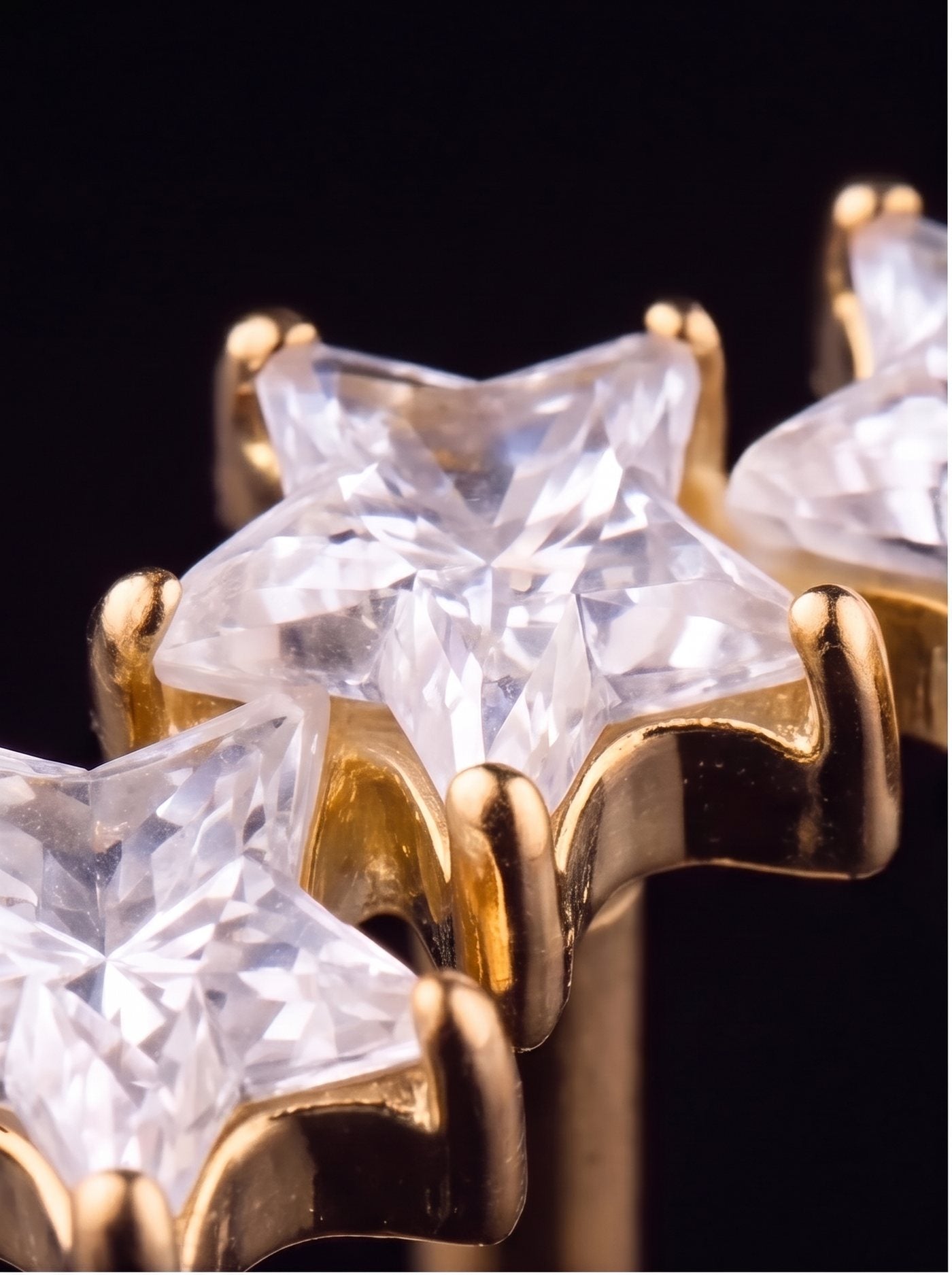 Stella — Three star-cut crystals ascending