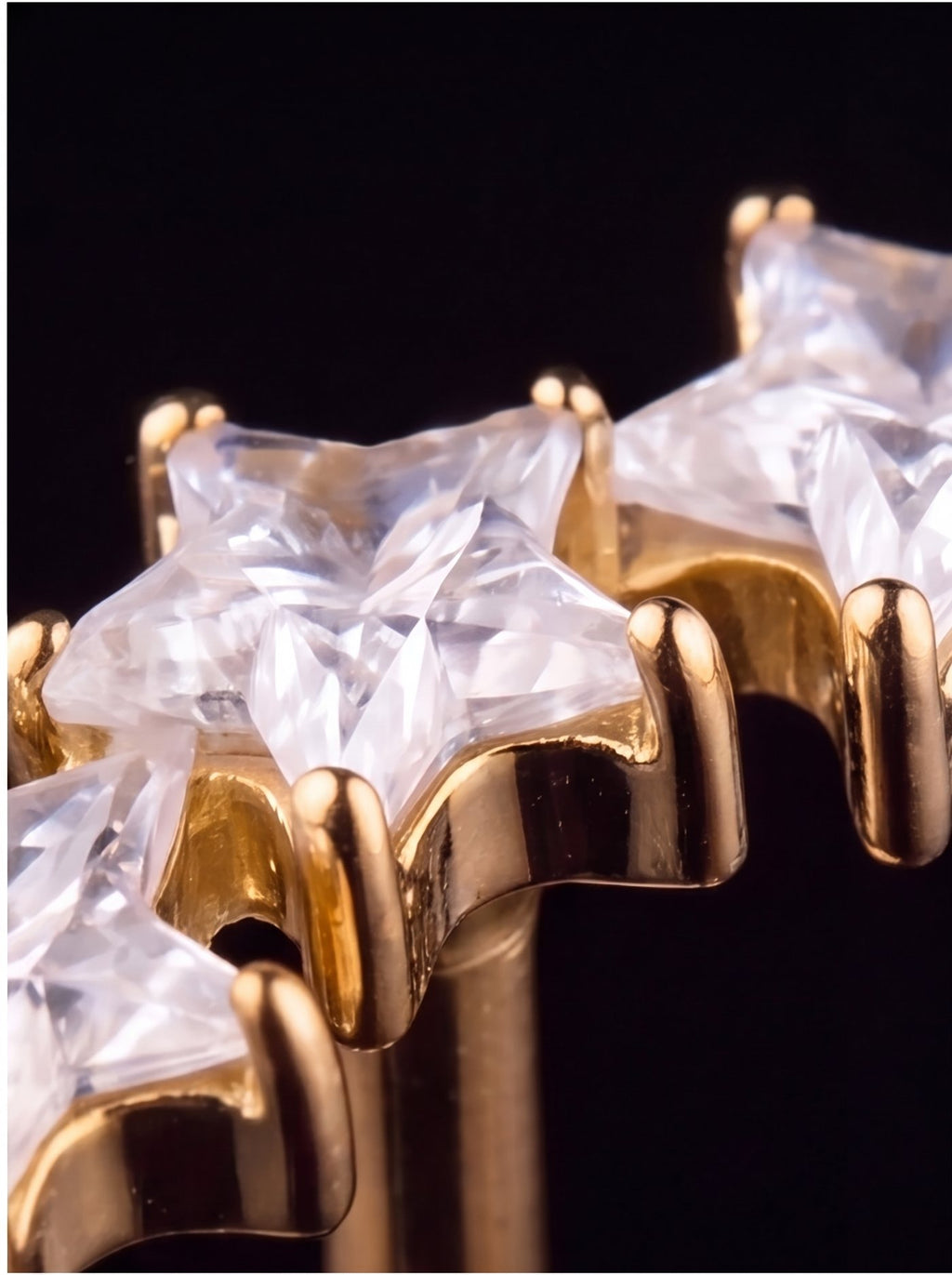 Stella — Three star-cut crystals ascending